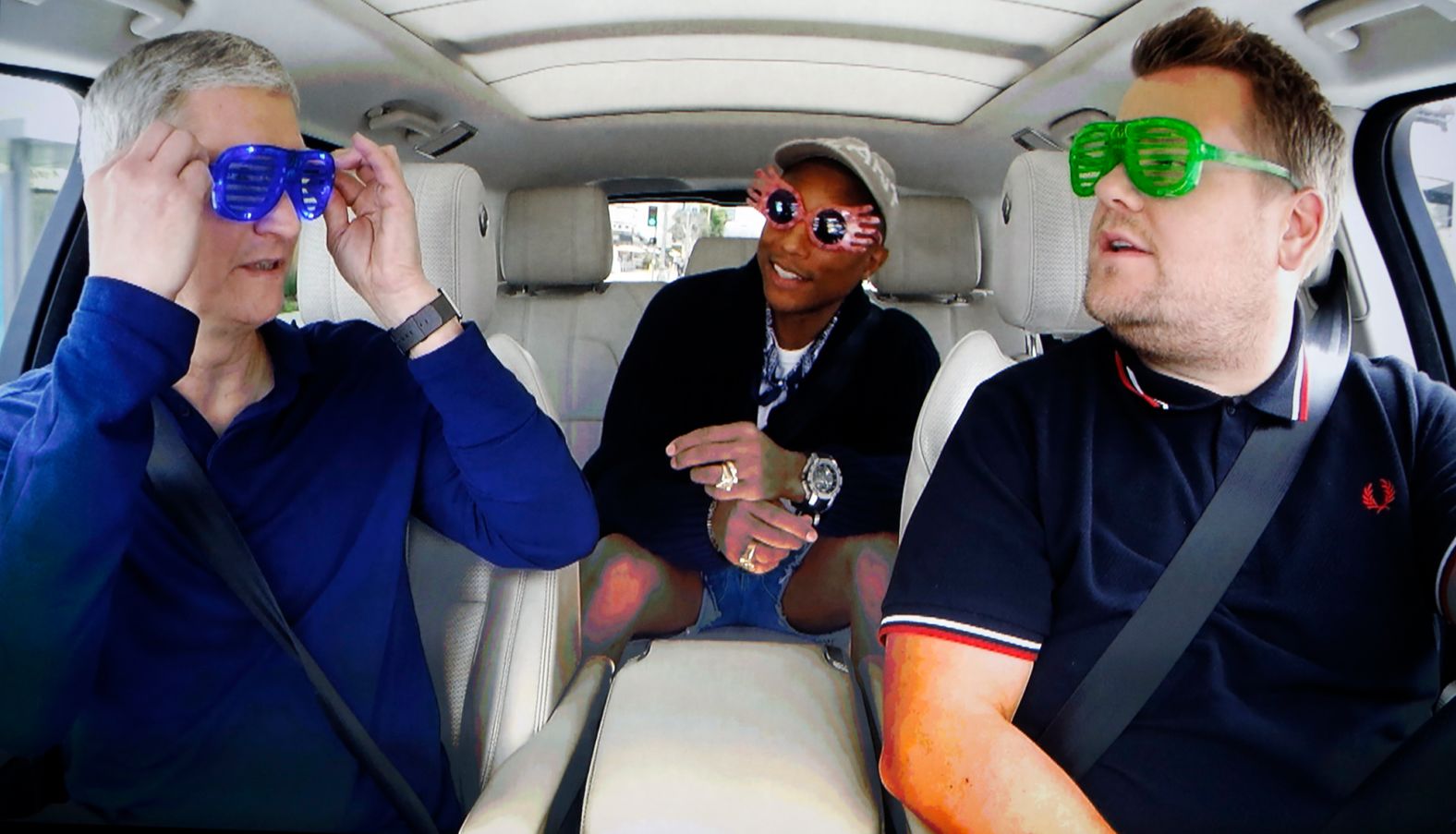 Cook is with James Corden and Pharrell during a taped comedy bit shown on a projection screen during an Apple event in San Francisco in September 2016.