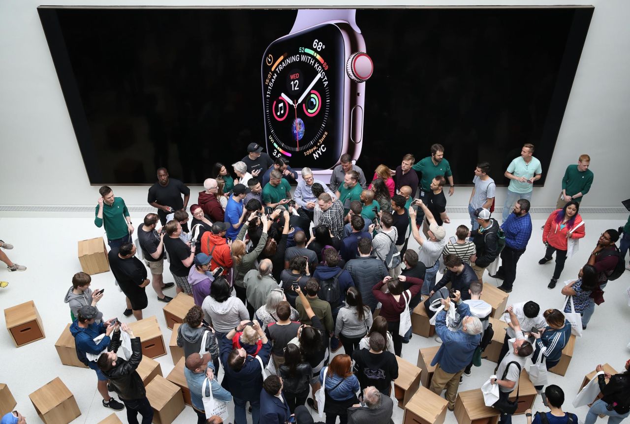 Cook welcomes customers to the opening of a new Apple Store at the historic Carnegie Library building in Washington, DC, on May 11, 2019. The location represented Apple's most extensive restoration project to date, renovating what was once the city's Central Public Library.