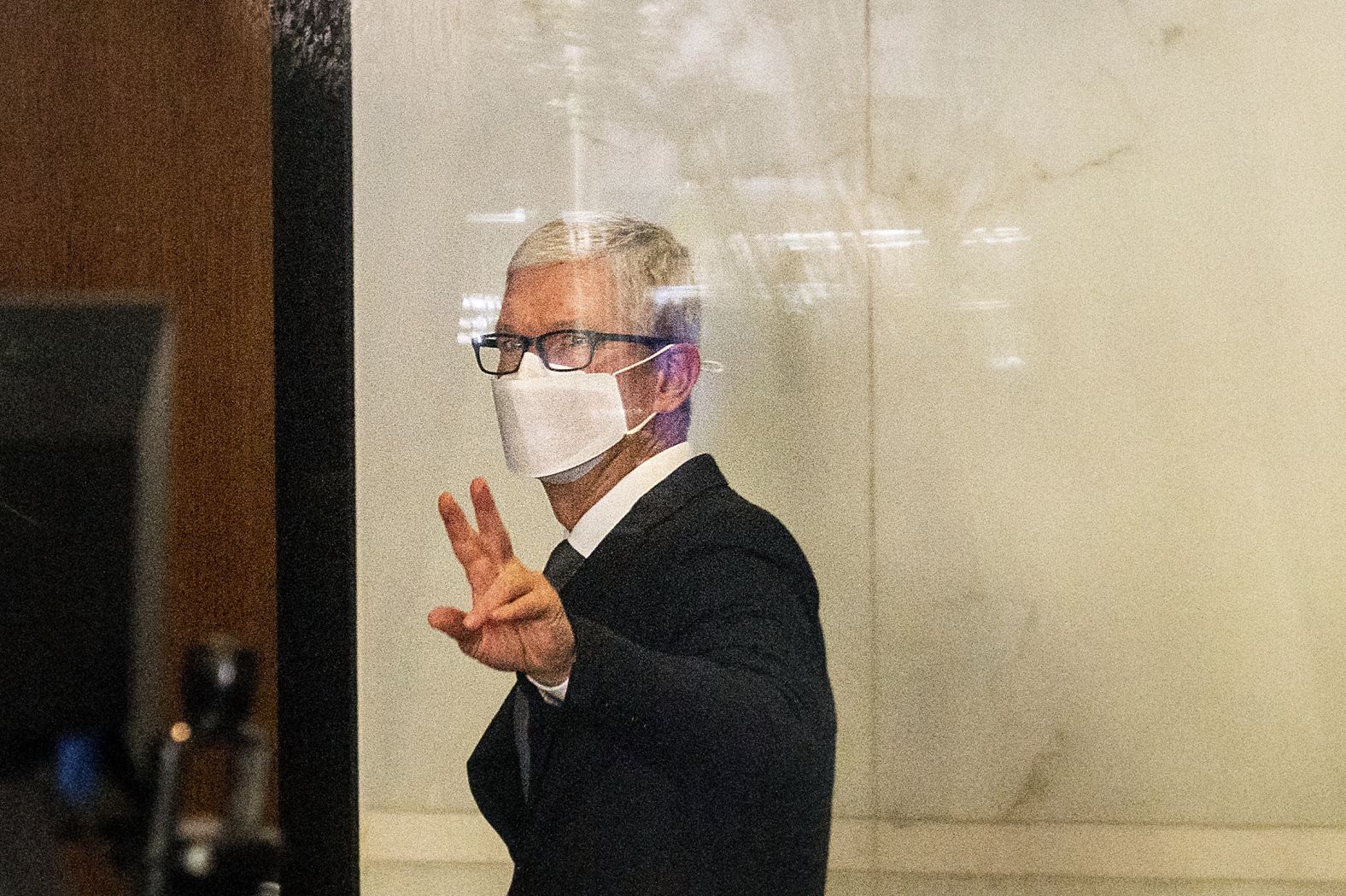 Cook leaves a federal building in Oakland, California, in May 2021 after testifying in a federal lawsuit brought by Epic Games. Epic, the maker of the video game Fortnite, charged that Apple has transformed its App Store into an illegal monopoly.