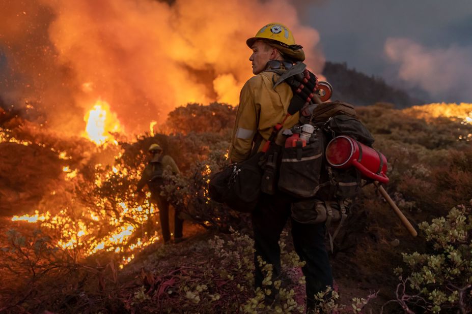 Crews battle California's Caldor Fire as it moved east toward Lake Tahoe on August 23.