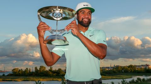 Tony Finau celebrates with the trophy after winning the Northern Trust. 