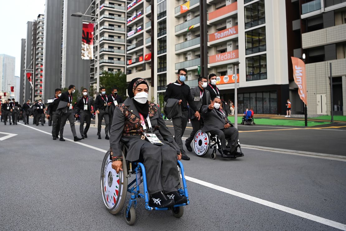 Members of Team Iran make their way to the Opening Ceremony of the Tokyo 2020 Paralympic Games.