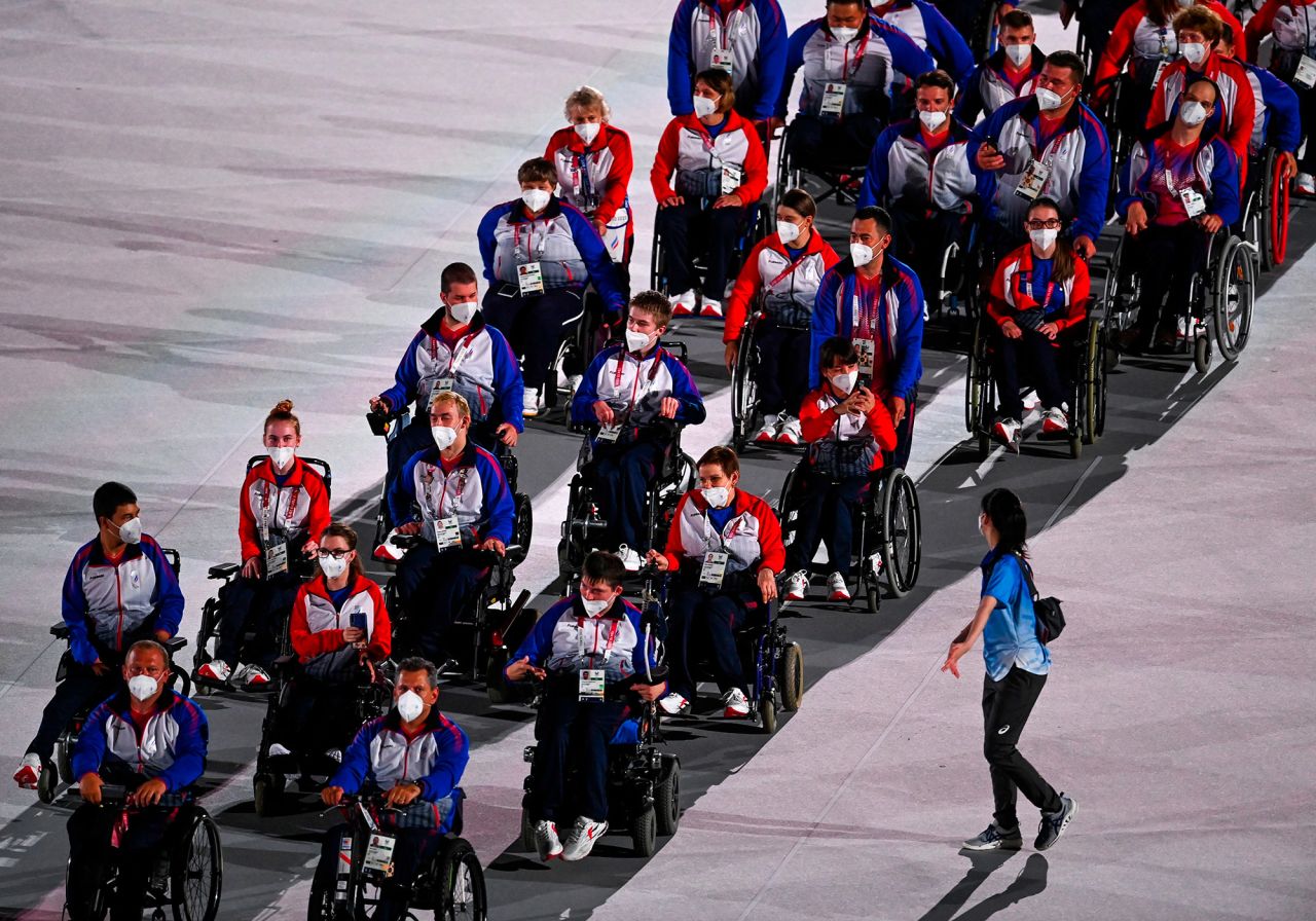 Russian athletes take part in the traditional parade during the opening ceremony. Russian athletes at these Paralympics are officially recognized as members of the Russian Paralympic Committee. That's because in 2019, the World Anti-Doping Agency banned Russia from all international sporting competitions, including the Olympics, for doping non-compliance. Russian athletes can't compete under their country's name, flag and national anthem until December 2022.