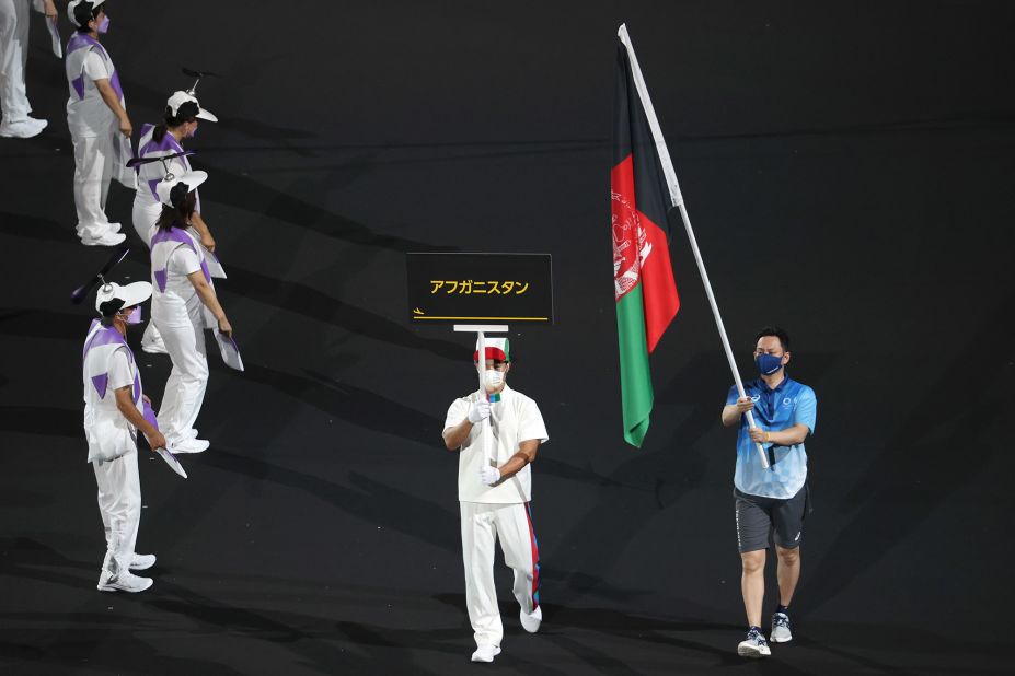 <a href="https://www.cnn.com/2021/08/24/sport/paralympics-afghanistan-tokyo-2020-preview-spt-intl/index.html" target="_blank">The flag of Afghanistan is presented</a> by volunteers at the ceremony. Afghanistan was the focus of the world's attention after <a href="http://www.cnn.com/2021/08/16/middleeast/gallery/taliban-afghanistan/index.html" target="_blank">the Taliban seized the capital,</a> and Afghan athletes pulled out of the Paralympics due to flights being canceled from the country. "We would like to have them here. Unfortunately it is not possible, but they will be here in spirit," said Andrew Parsons, president of the International Paralympic Committee, on the eve of the ceremony.