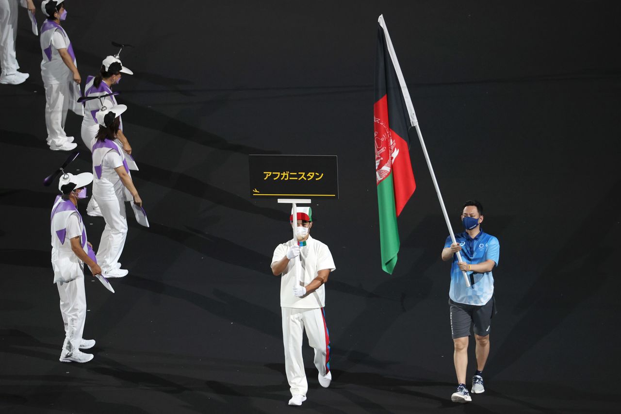 <a href="https://www.cnn.com/2021/08/24/sport/paralympics-afghanistan-tokyo-2020-preview-spt-intl/index.html" target="_blank">The flag of Afghanistan is presented</a> by volunteers at the ceremony. Afghanistan was the focus of the world's attention after <a href="http://www.cnn.com/2021/08/16/middleeast/gallery/taliban-afghanistan/index.html" target="_blank">the Taliban seized the capital,</a> and Afghan athletes pulled out of the Paralympics due to flights being canceled from the country. "We would like to have them here. Unfortunately it is not possible, but they will be here in spirit," said Andrew Parsons, president of the International Paralympic Committee, on the eve of the ceremony.