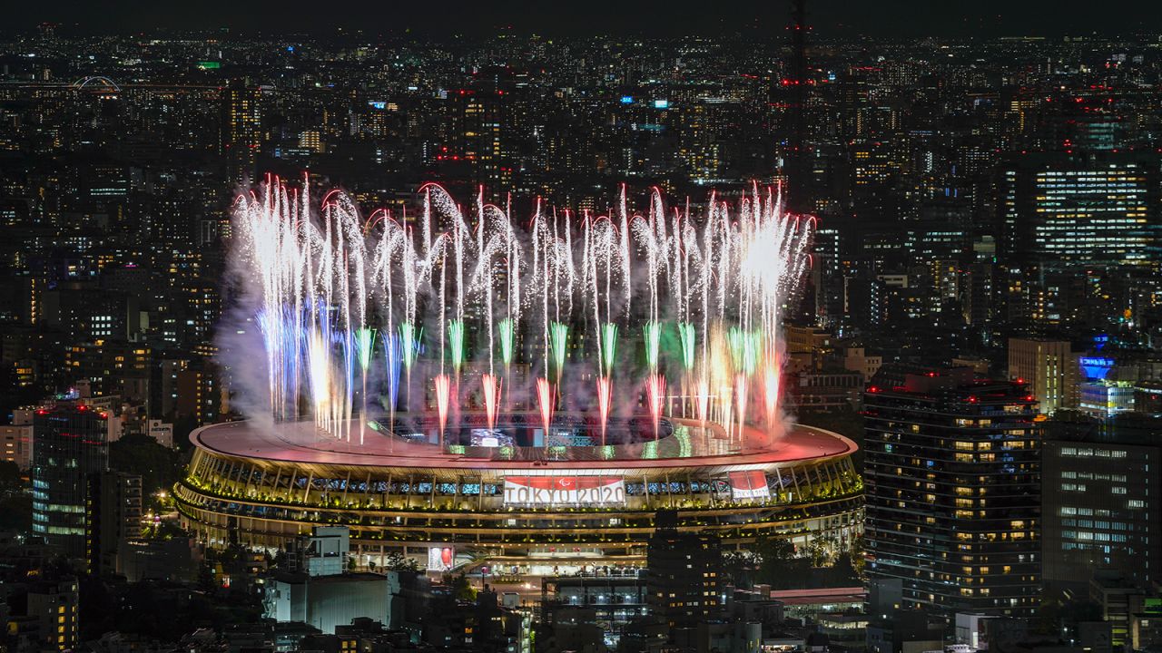 Fireworks illuminate the skies of Tokyo over the National Stadium during the Opening Ceremony.