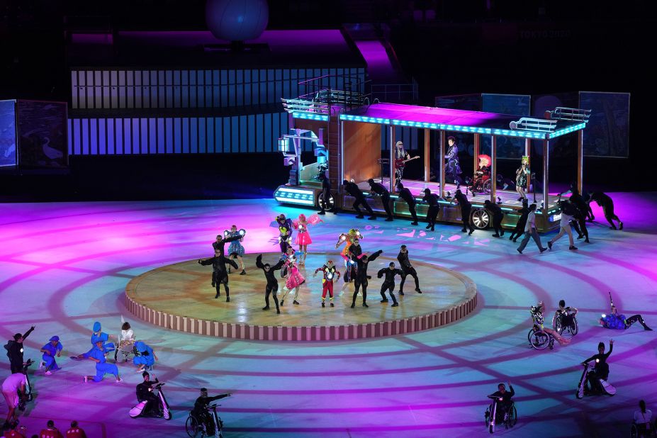 Entertainers perform during the opening ceremony, which was held at Tokyo's National Stadium.