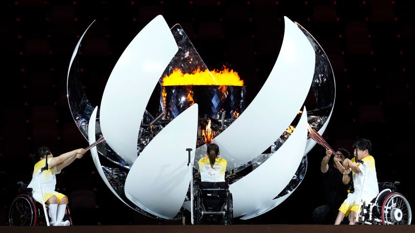 Athletes light the Paralympic cauldron during the opening ceremony for the 2020 Paralympics at the National Stadium in Tokyo, Tuesday, Aug. 24, 2021. (AP Photo/Shuji Kajiyama)