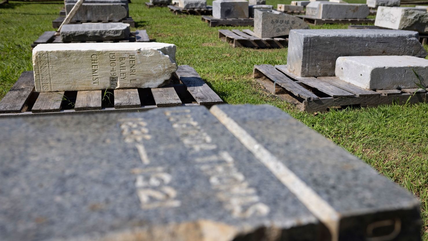 Gravestones sit on pallets during a ceremonial transfer Monday at Caledon State Park in King George, Va.