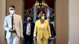 House Speaker Nancy Pelosi (D-CA) speaks to a reporter as she walks to the floor of the House Chambers to give remarks at the U.S. Capitol on August 24, 2021 in Washington, DC. 