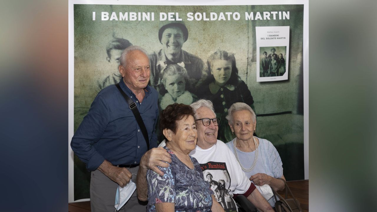 From left: Bruno Naldi, 83, Giuliana Naldi, 82, World War II veteran Martin Adler, 97, and Mafalda Naldi, 79.