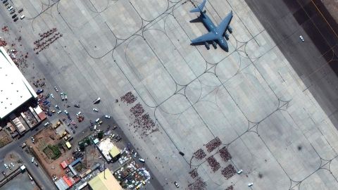In this satellite photo released by Maxar Technologies, Kabul's international airport is seen amid evacuations on Monday, Aug. 23, 2021. 