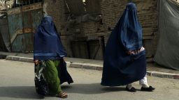 Afghan women in burqas walk on a street in Kabul, Afghanistan, Sunday, Aug. 22, 2021. (AP Photo/Rahmat Gul)