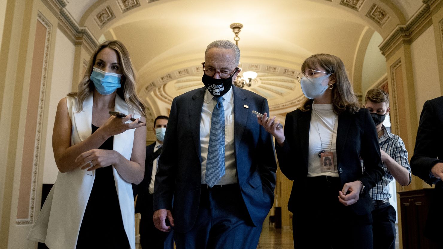 Senate Majority Leader Chuck Schumer speaks with reporters in Washington on August 5.