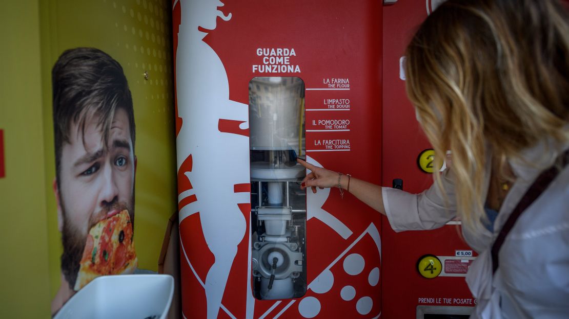 The machine has enough flour and water to make 100 pizzas at a time.