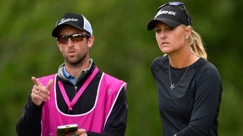 Nordqvist discusses a shot with her caddie during the final round of The Evian Championship in 2017.
