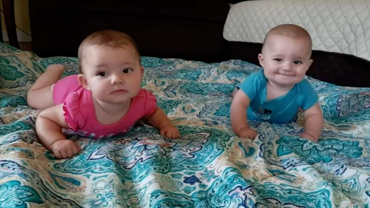 Rileigh and Ryan Rigney, 7-month-old twins, were swept away in Saturday's flooding.