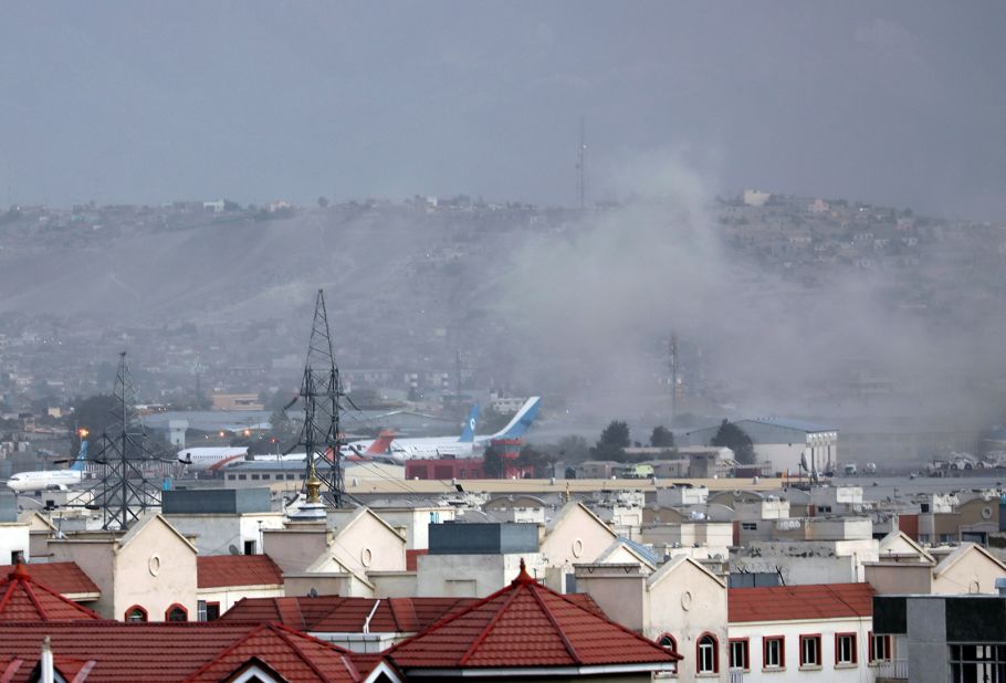 Smoke rises from the explosion outside the airport in Kabul on August 26.