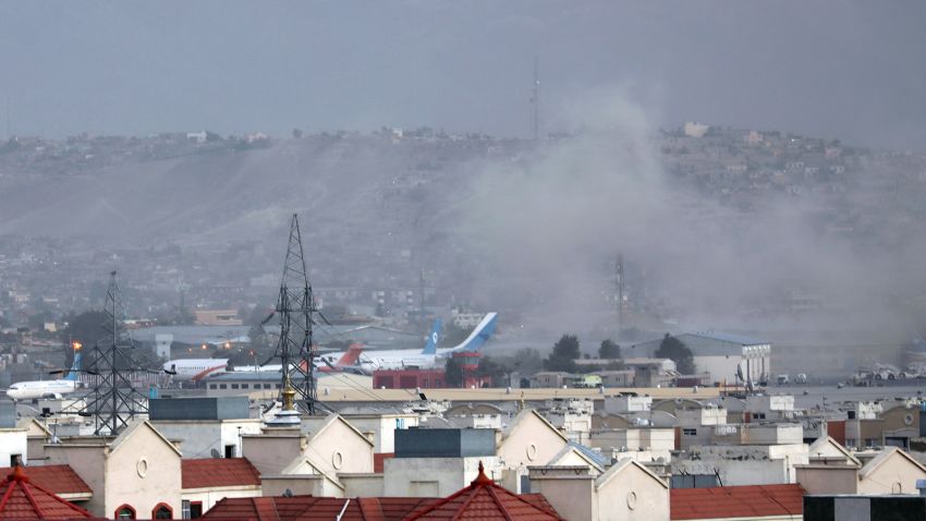 Smoke rises from explosion outside the airport in Kabul, Afghanistan, Thursday, August 26, 2021.