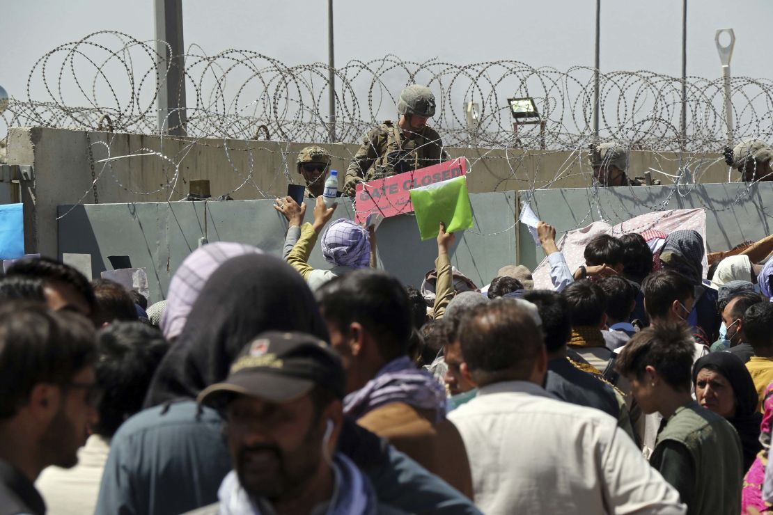 Thousands of Afghans gathered outside Kabul airport while US evacuations were ongoing, desperate for a flight out of the country.