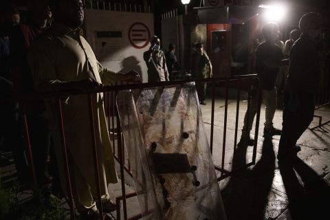 A bloodied shield stands outside the entrance of a Kabul hospital after Thursday's attack.