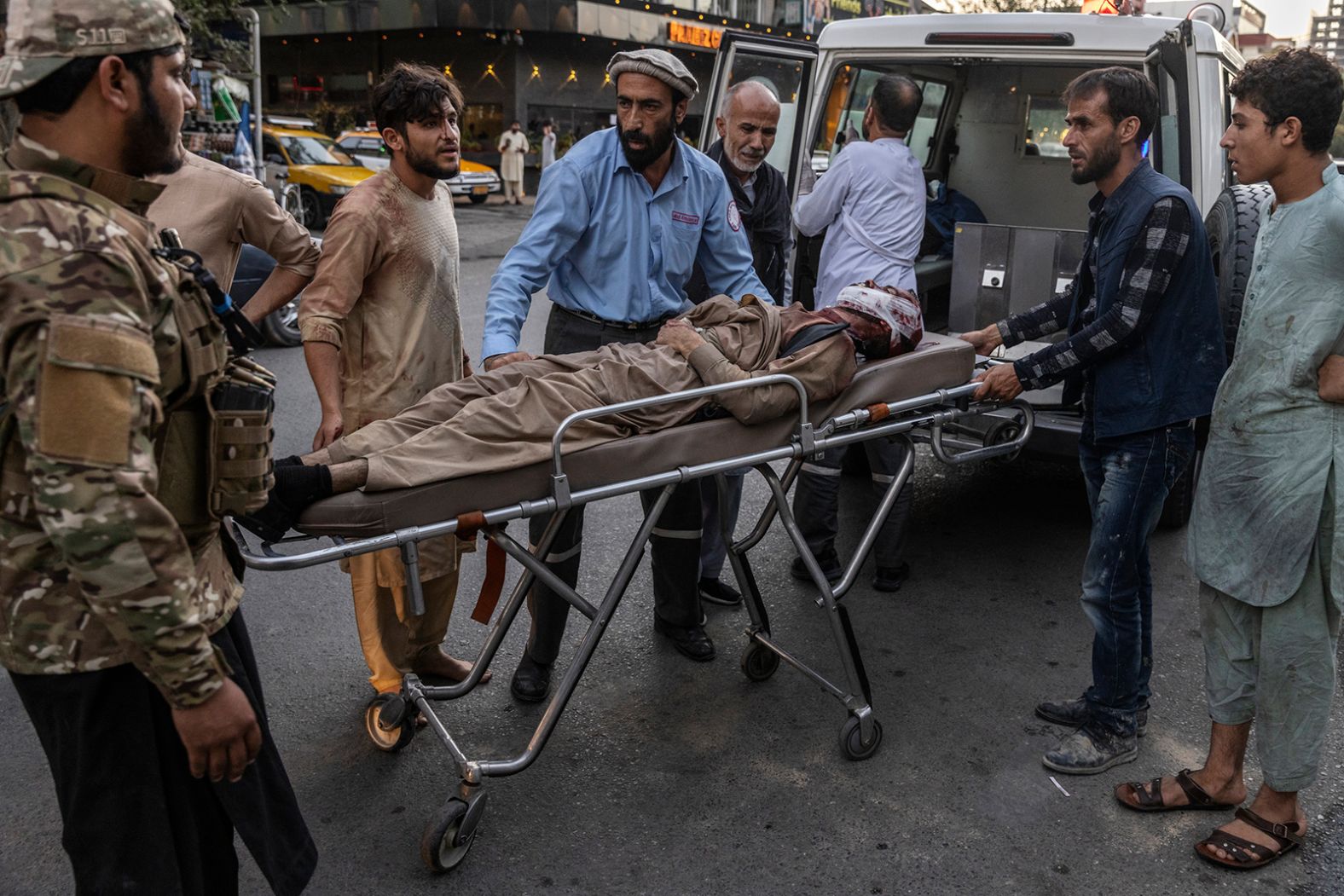 An injured person arrives at a hospital after <a href="index.php?page=&url=https%3A%2F%2Fwww.cnn.com%2F2021%2F08%2F26%2Fasia%2Fafghanistan-kabul-airport-blast-intl%2Findex.html" target="_blank">a suicide bomb attack</a> caused casualties on Thursday, August 26, outside the international airport in Kabul, Afghanistan.