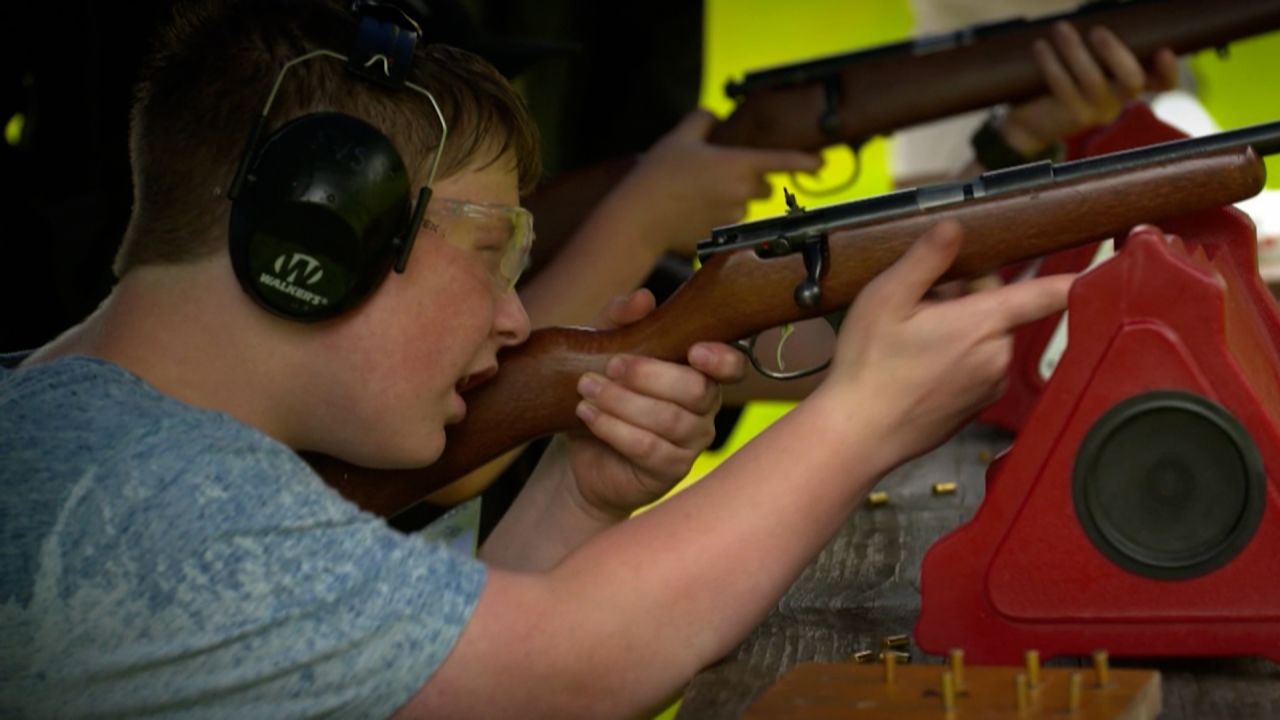 Ashton Morse, 11, fires a gun at a 4-H  Club training event in Sandgate, Vermont.