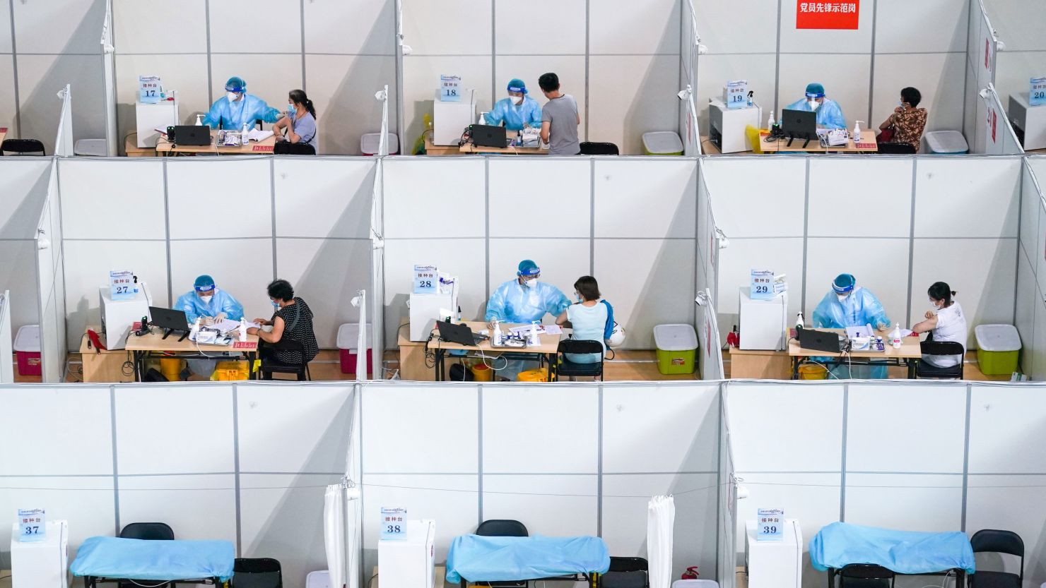 Residents get inoculated against Covid-19 at a vaccination site in a stadium in Nanjing, China's Jiangsu Province on August 2.