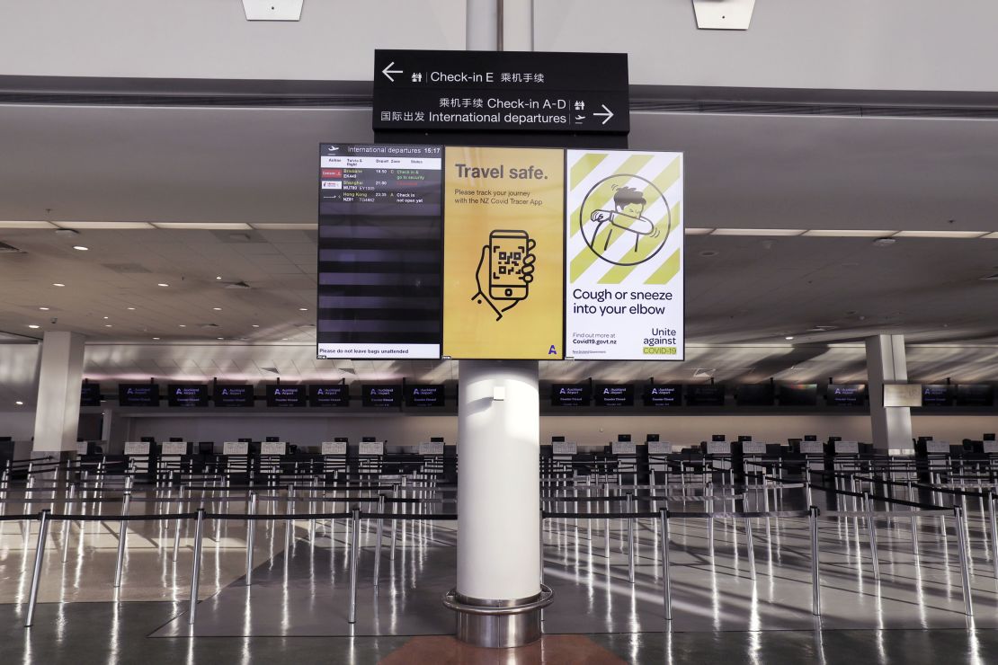 An information board in a deserted check-in hall at the Auckland Airport on July 7, 2020. 
