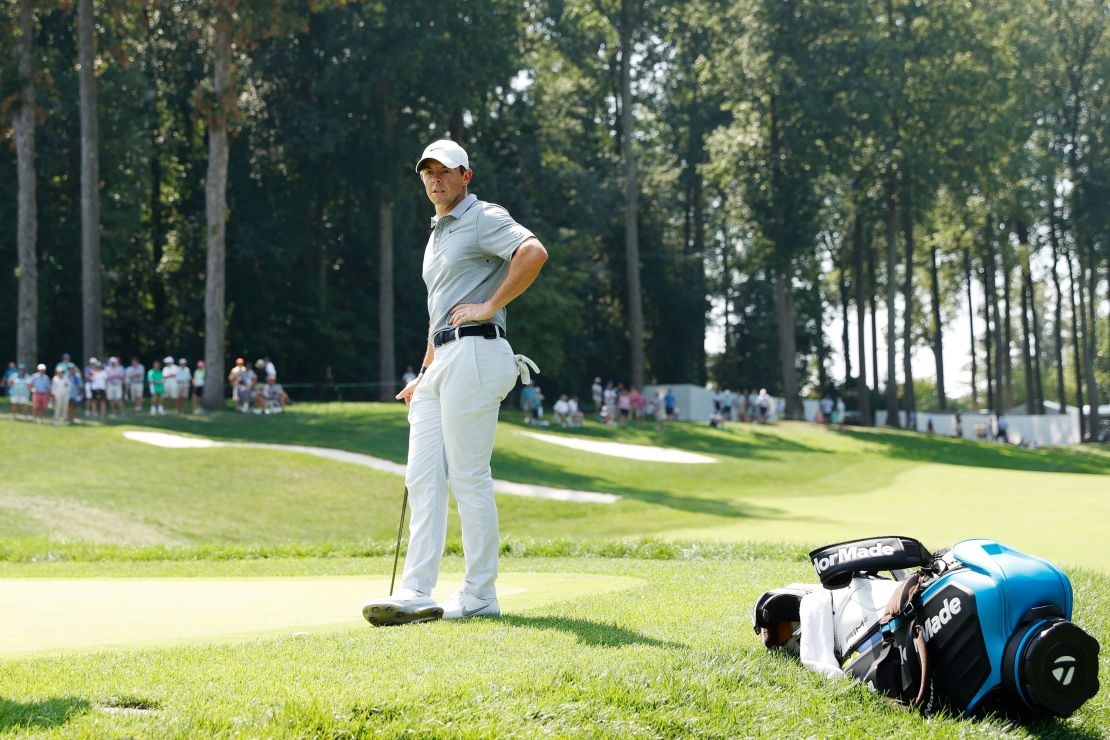 McIlroy looks on over the first green during the first round of the BMW Championship.