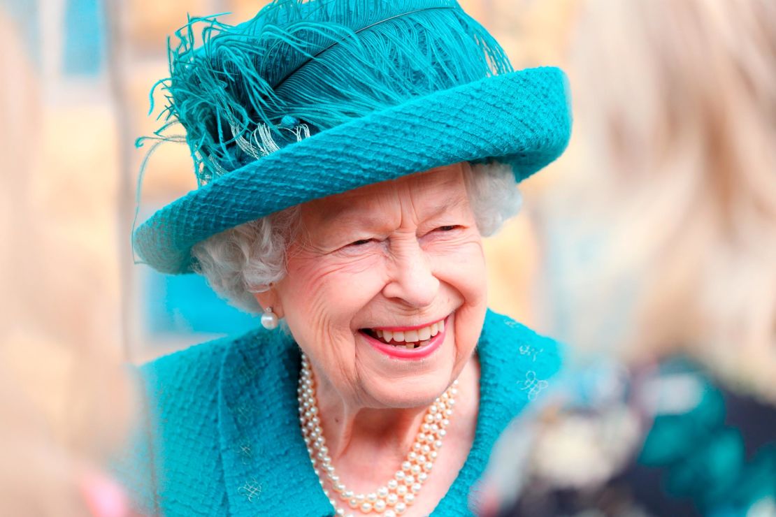 Queen Elizabeth II visits the set of the long-running television series "Coronation Street," on July 8, 2021 in Manchester, England. 