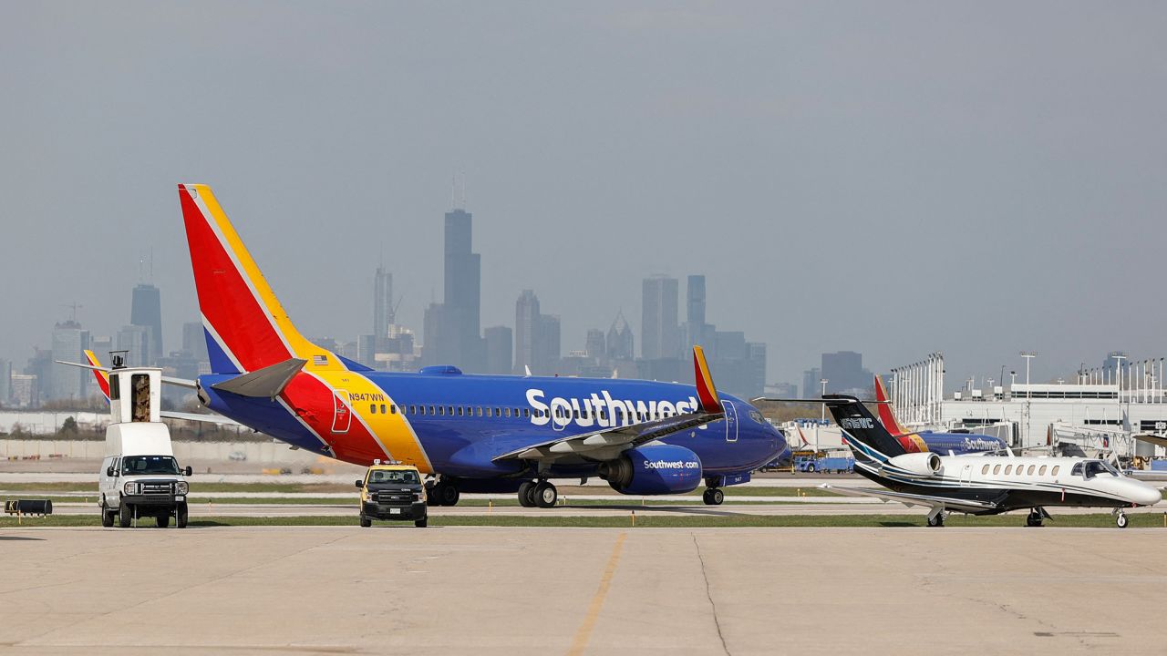 A Southwest Airlines Boeing 737-700 jet taxis to the gate after landing at Midway International Airport in Chicago, Illinois, on April 6, 2021.