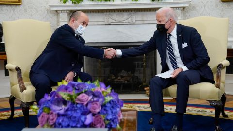 President Joe Biden shakes hands with Israeli Prime Minister Naftali Bennett as they meet in the Oval Office of the White House, Friday, Aug. 27, 2021, in Washington. 