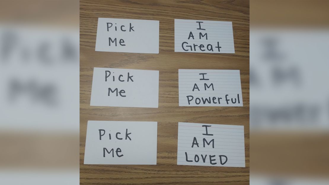 When students can't think of any affirmations, Neffiteria Acker offers them cards with positive messages written on them.  