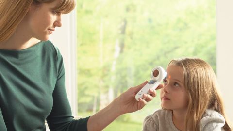 Brown digital no-touch forehead thermometer 