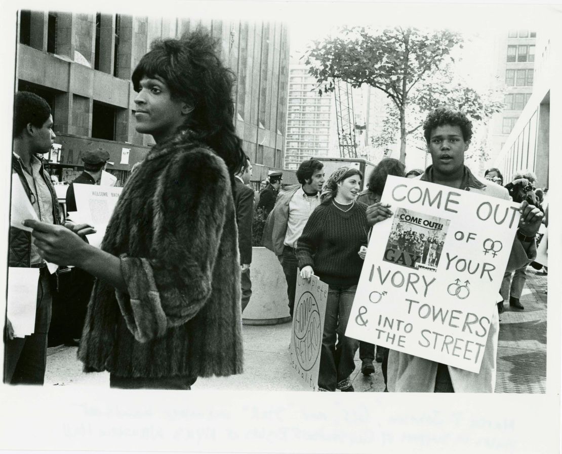 A 1970 photo of Marsha P. Johnson handing out flyers in support of Gay Students at NYU is seen here courtesy of the New York Public Library's "1969: The Year of Gay Liberation" exhibit. 