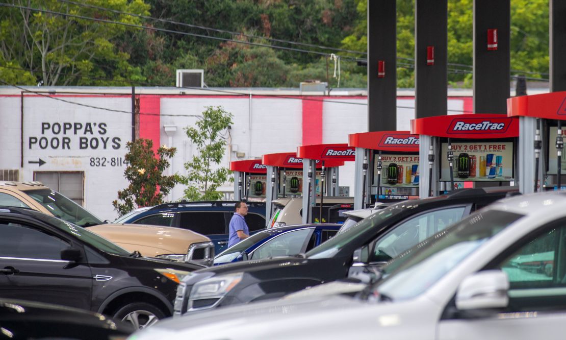 Long lines build at a gas station in Jefferson, Louisiana, as people prepare for the arrival of Hurricane Ida on Friday, Aug. 27, 2021.
