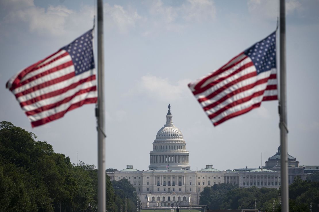 American flags fly at half staff on August 27 near the US Capitol following the deaths of 13 members of the US military in Thursday's attack at the airport in Kabul, Afghanistan.