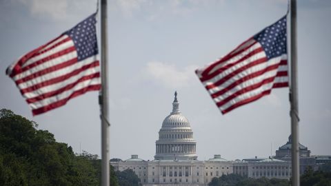 American flags fly at half staff on August 27 near the US Capitol following the deaths of 13 members of the US military in Thursday's attack at the airport in Kabul, Afghanistan.
