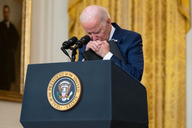 US President Joe Biden pauses as he listens to a question about the suicide bombing on August 26. He <a href="index.php?page=&url=https%3A%2F%2Fwww.cnn.com%2F2021%2F08%2F26%2Fpolitics%2Fbiden-kabul-attack%2Findex.html" target="_blank">vowed to retaliate</a> for the attack. "We will not forgive. We will not forget. We will hunt you down and make you pay," he said.