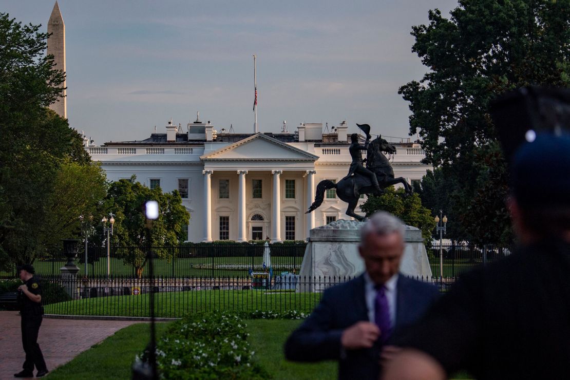 The US flag flies at half staff on August 26 over the White House.