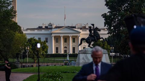 The US flag flies at half staff on August 26 over the White House.