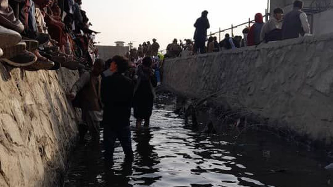 Once the Taliban took control of Afghanistan, Carter says the women's national football team had to burn their uniforms and deleted their social media accounts. They sent her imagery of fellow Afghans wading through sewer water in search of salvation.