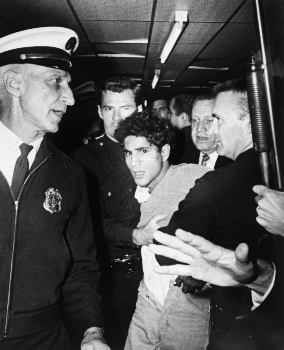 Sirhan Sirhan is led away from the Ambassador Hotel after the shooting of Sen. Robert F. Kennedy