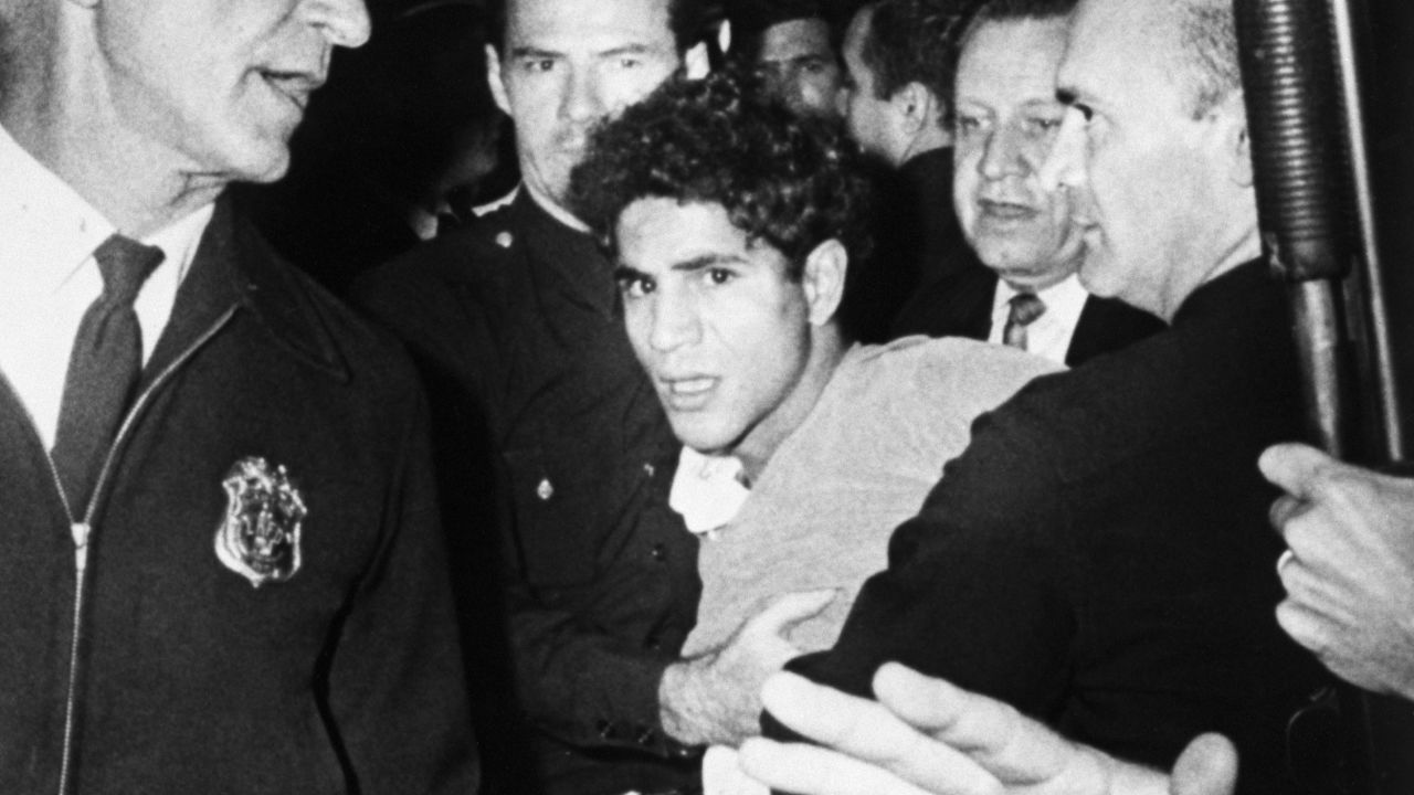 Sirhan Sirhan is led away from the Ambassador Hotel after the shooting of Sen. Robert F. Kennedy