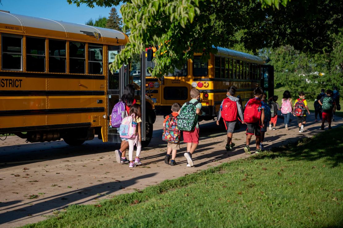 Students arrive for their first day of school on Wednesday, Aug. 25, 2021 at Westlake Elementary School in Battle Creek, Michigan.