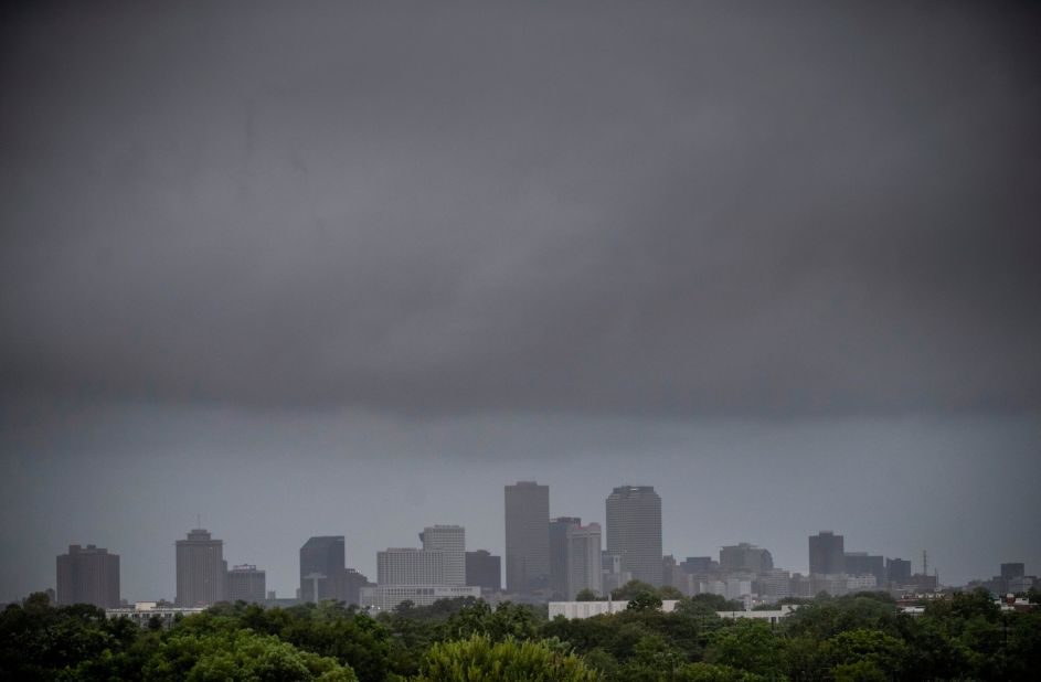 A wall of rain moves over downtown New Orleans on August 29.