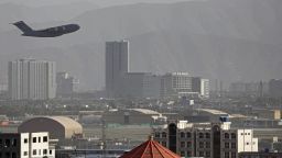 TOPSHOT - A US Air Force aircraft takes off from the military airport in Kabul on August 27, 2021, as the Pentagon said the evacuation of tens of thousands of people from Afghanistan still faces more possible attacks like the bombing that killed scores of people outside the Kabul airport. (Photo by - / AFP) (Photo by -/AFP via Getty Images)