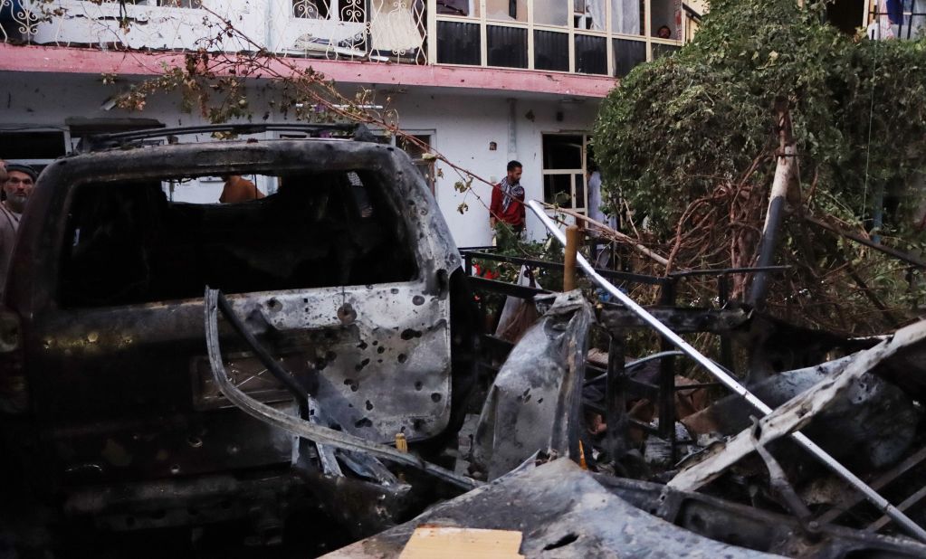 A damaged car is seen in Kabul after <a href="https://www.cnn.com/2021/08/29/asia/afghanistan-kabul-evacuation-intl/index.html" target="_blank">a US drone strike</a> reportedly targeted a suspected ISIS-K suicide bomber on August 29. US officials believe ISIS-K, the ISIS branch that rivals the Taliban in Afghanistan, was likely behind <a href="http://www.cnn.com/2021/08/26/middleeast/gallery/kabul-deadly-blasts-afghanistan-airport/index.html" target="_blank">the August 26 bomb attack</a> that killed <a href="https://www.cnn.com/2021/08/27/us/kabul-attack-us-service-members-killed/index.html" target="_blank">13 US service members</a> and at least 170 others.