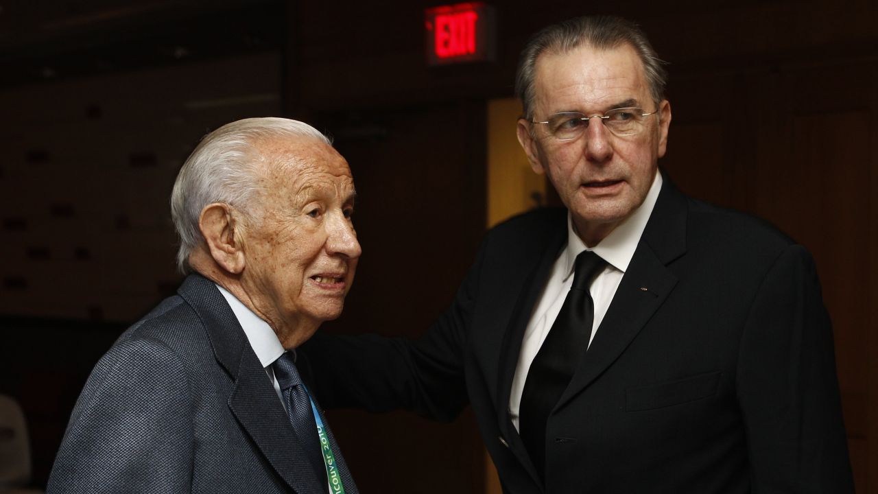 IOC President Jacques Rogge, right, stands with his predecessor, Juan Antonio Samaranch, at the Opening Ceremony of the 2010 Vancouver Winter Olympics on February 12, 2010.